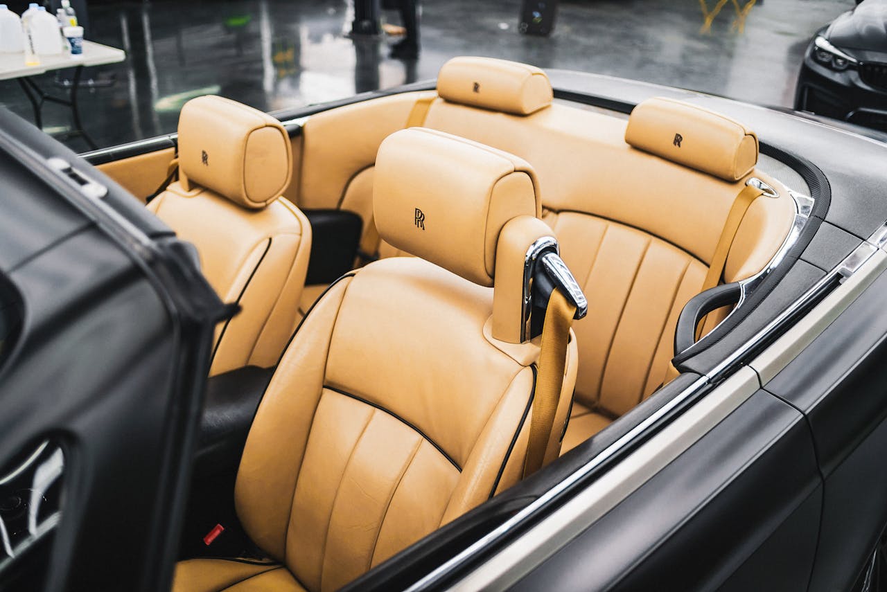 award-img Explore the exquisite tan leather seats of an upscale convertible for ultimate comfort and style.